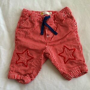 Mini Boden red striped pants with tonal embroidery stars, pocket & fly details